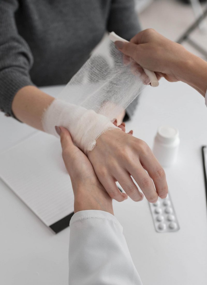 doctor-arranging-hand-bondage-patient